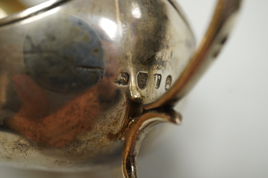 A William IV silver rectangular vinaigrette, by Nathaniel Mills, Birmingham 1830, 30mm(tired), together with a William IV silver pap boat, London, 1832, with later added hallmarked Victorian handle.